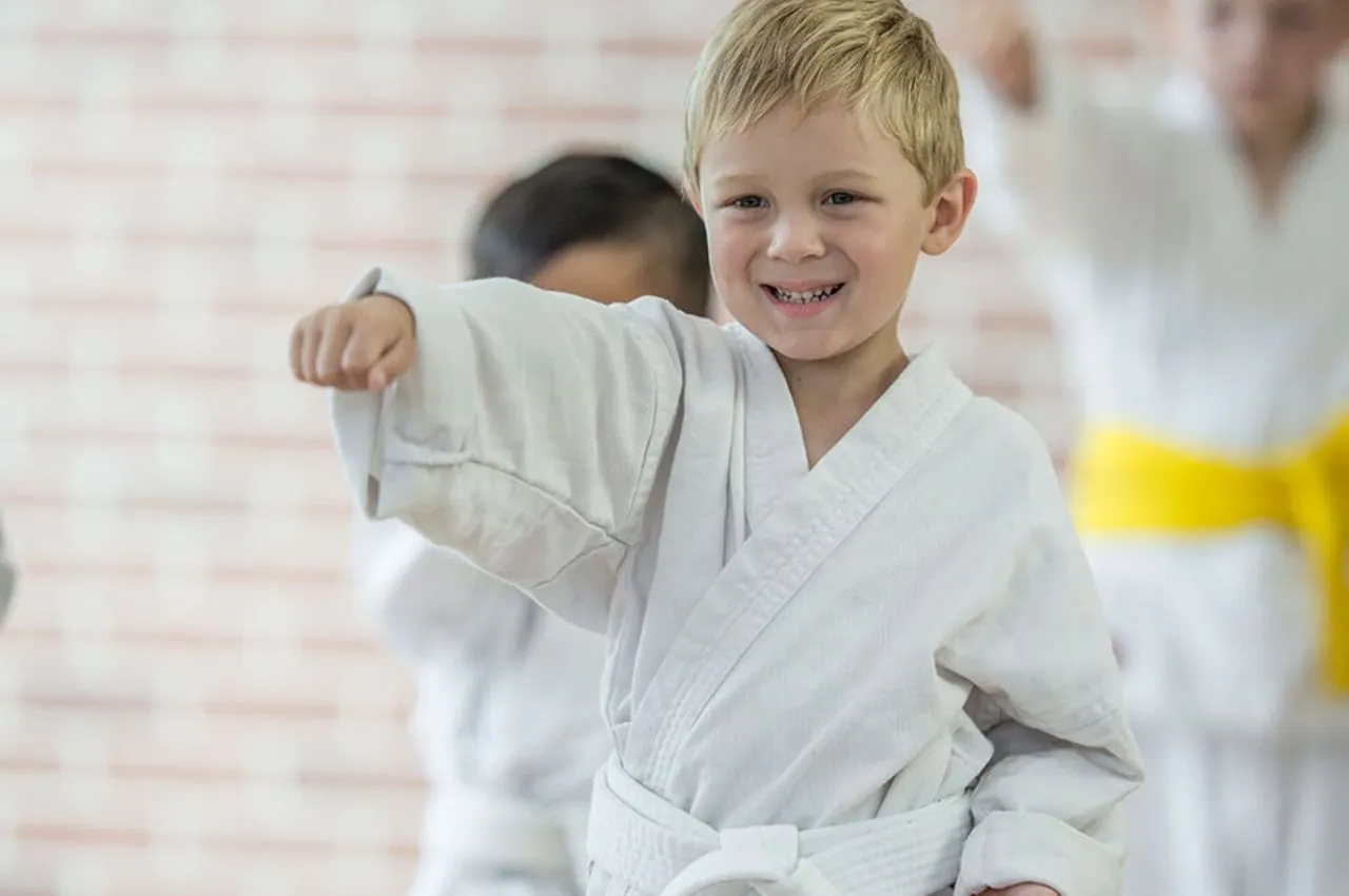 Child building coordination in martial arts